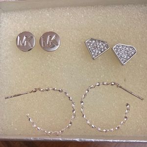 3 faux silver earrings